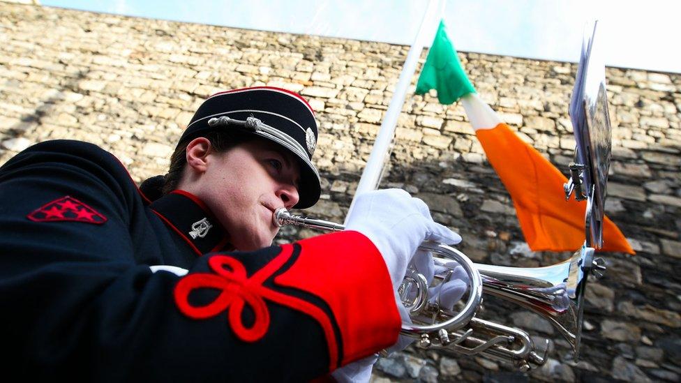 Bandswoman Jane Hilliard from the Army No 1 Band plays "The Last Post" during a wreath laying ceremony on the site where the 1916 leaders were executed at the Breakers Yard in Kilmanham Gaol in Dublin