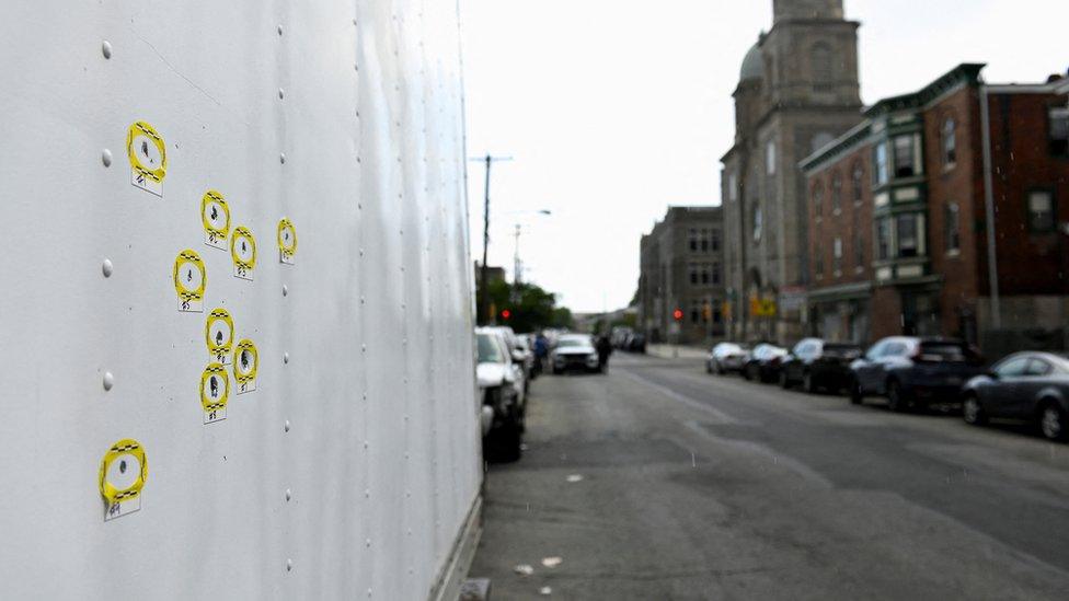 Bullet holes seen at the site of the shooting in Philadelphia