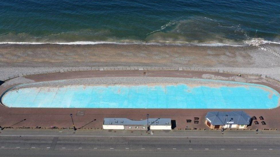 An empty paddling pool along the seafront in Llandudno, Conwy