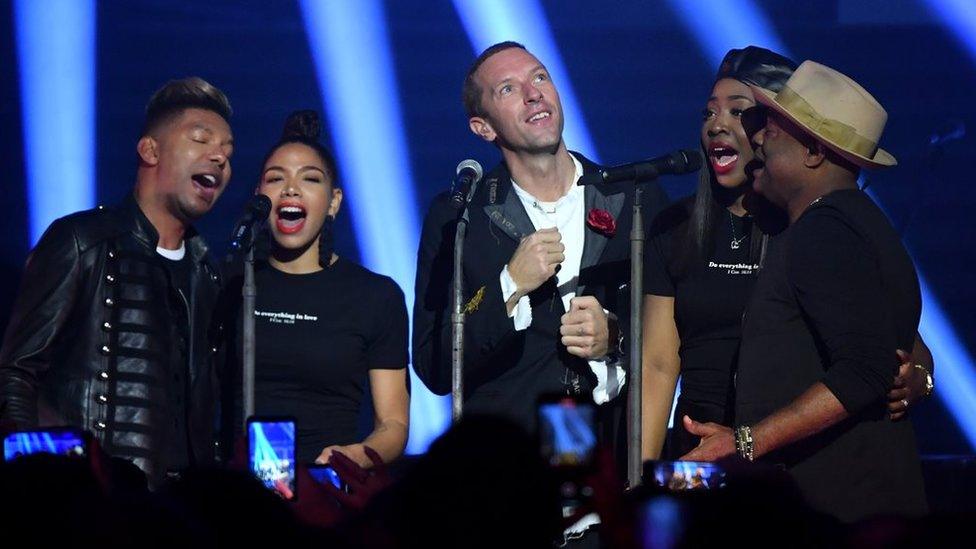 Chris Martin and a gospel choir