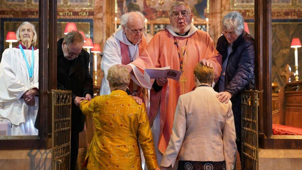 Catherine Bond (left) and Jane Pearce being blessed at St John the Baptist Church in Felixstowe, Suffolk