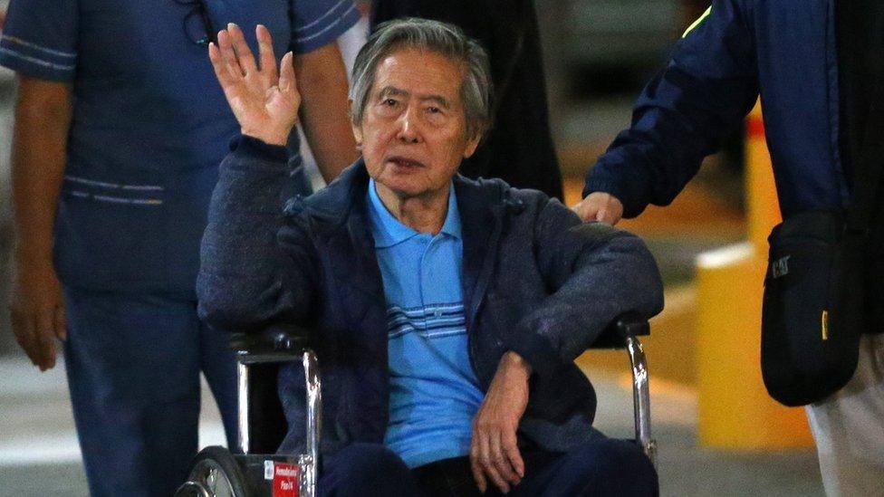 Former Peruvian President Alberto Fujimori accompanied by his son Kenji Fujimori (R) leaves the Centenario hospital in Lima, Peru, January 4, 2018.