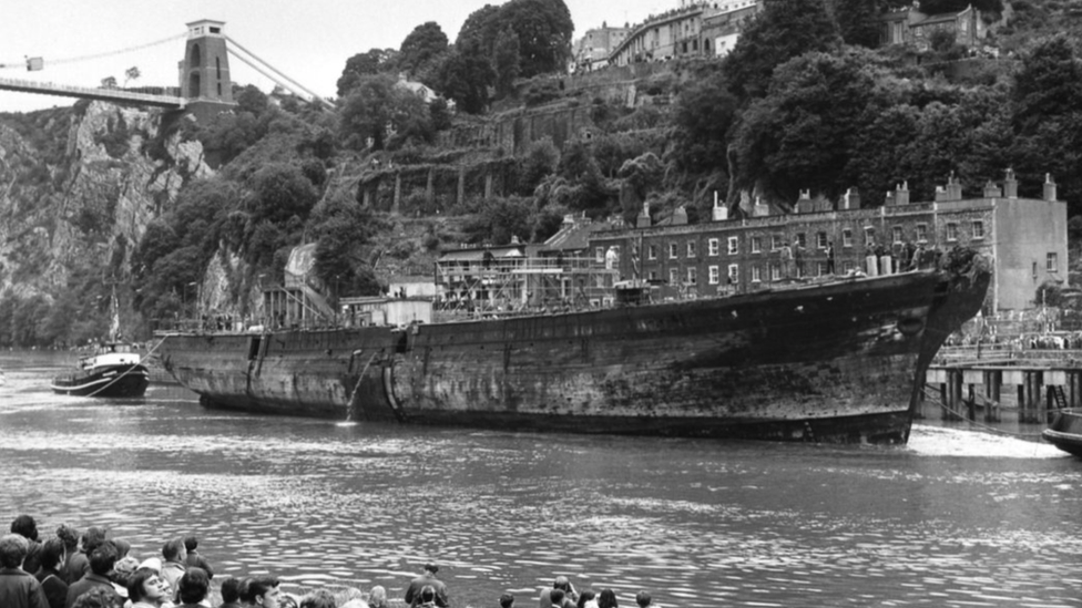 Archive photo of the ship sailing into Bristol, passing under the Clifton Suspension Bridge, also by IKB