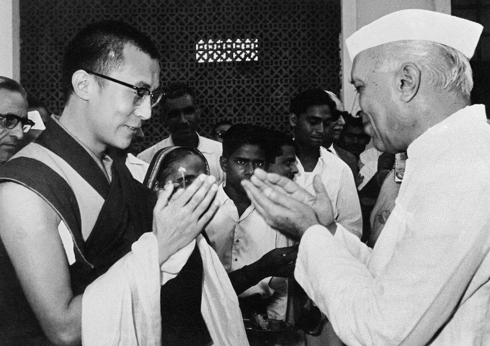 The Dalai Lama( L) and Indian's first prime minister, Jawaharlal Nehru, in Delhi