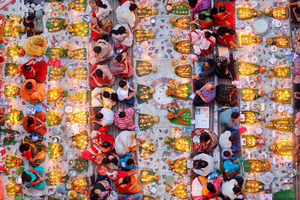 Hindus prepare to break their daylong fast in a temple in Dhaka, Bangladesh