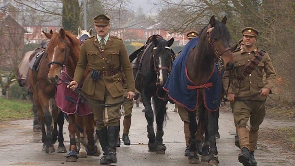 Members of the Royal Canadians cavalry prepare to recreate the charge