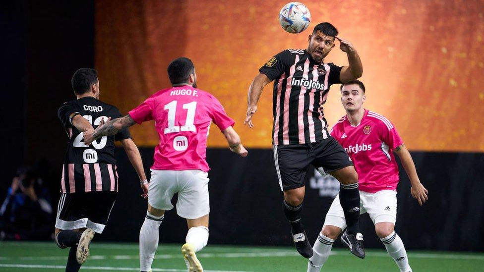 Sergio Aguero heading the ball