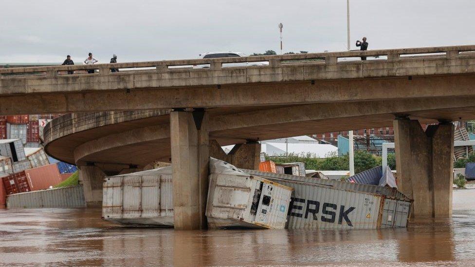 Shipping containers submerged in water in Durban