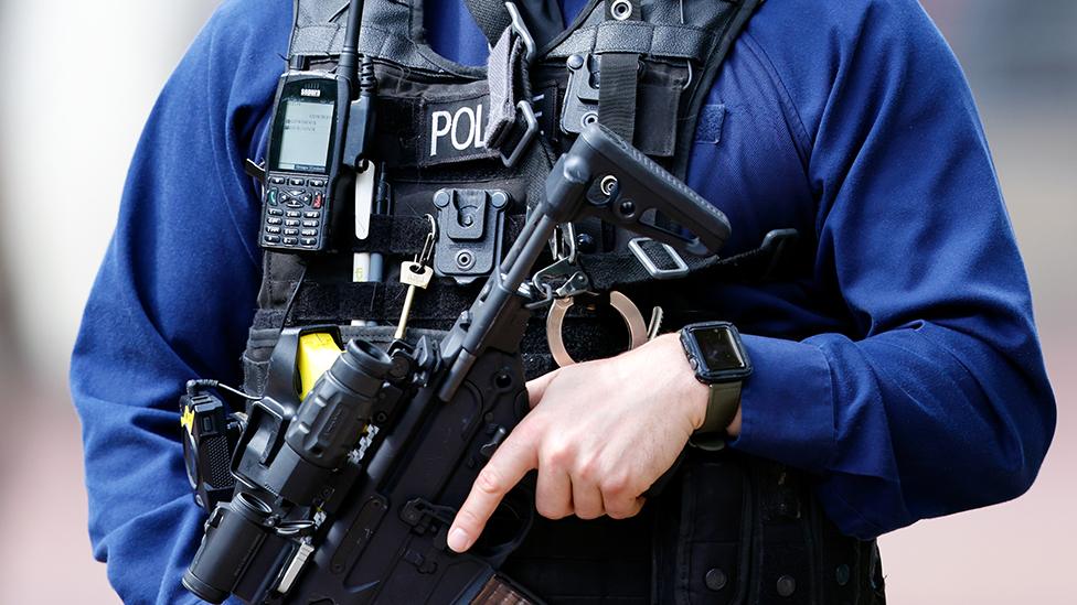 File photo of Metropolitan Police firearms officer (carrying a SIG Sauer weapon) patrols The Mall ahead of the Colonel's Review at Horse Guards Parade on May 28, 2022 in London, England