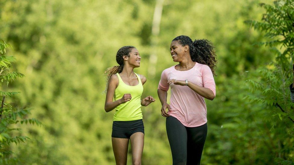 daughter and mother out running