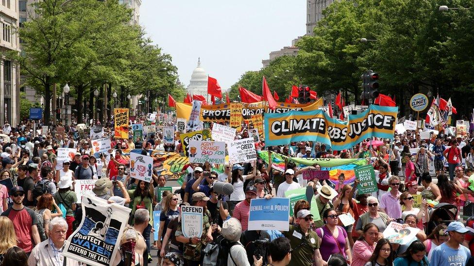 Protesters march from the US Capitol to the White House in Washington, DC, USA, 29 April 2017