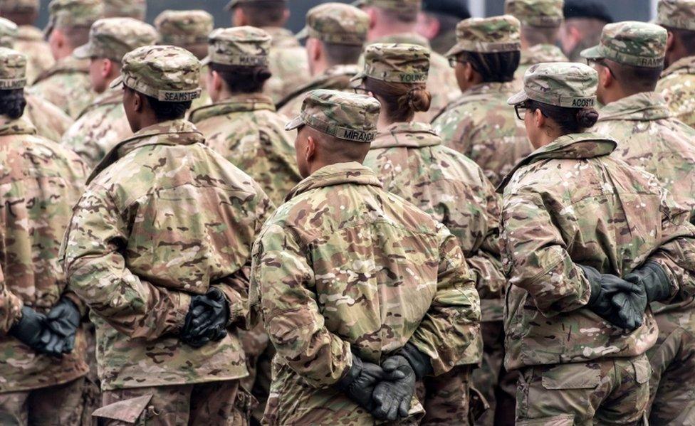 US soldiers stand in formation during the military picnic "Safe Poland" in the town of Boleslawiec on 5 February, 2017.