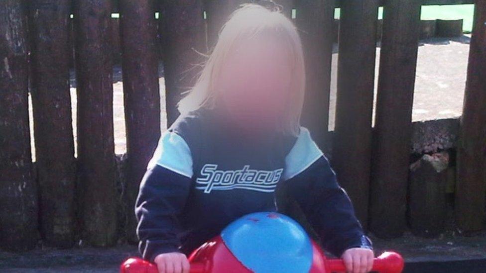 Jason on a playground ride