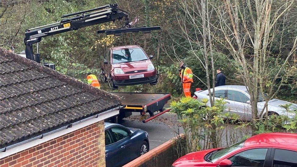 Cars being lifted