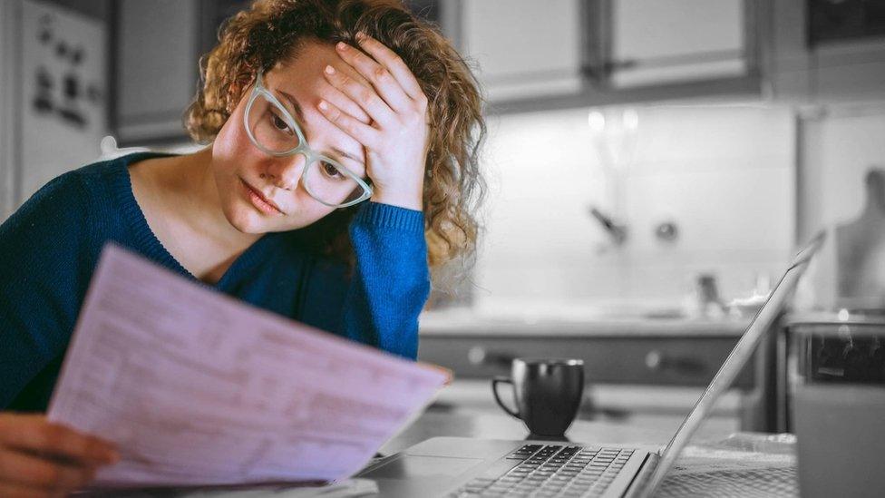 A student looking at her finances