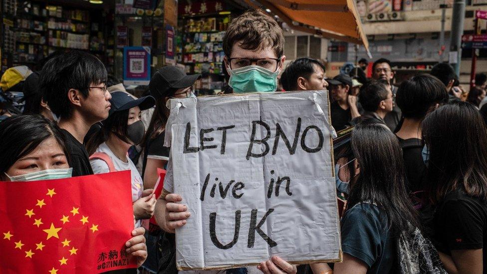 A protester advocating for BNO citizens to be able to live in the UK