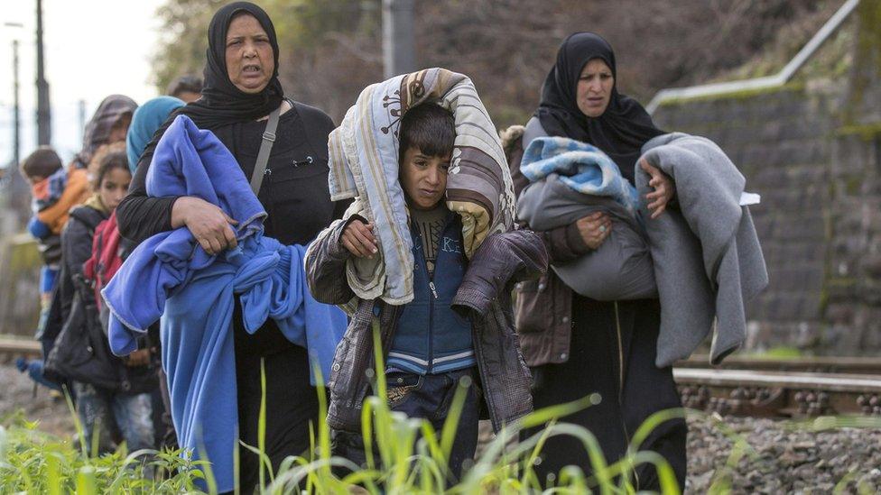 Migrants on railway line in Spielfeld, Austria, 23 Oct 15