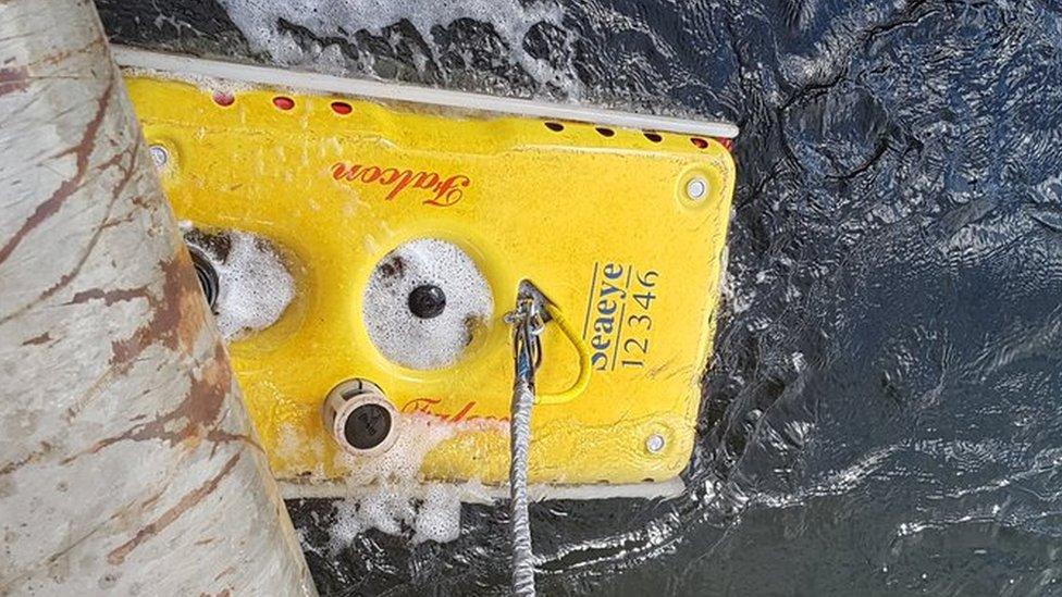 Remotely operated vehicle emerges from beneath the Corran Ferry