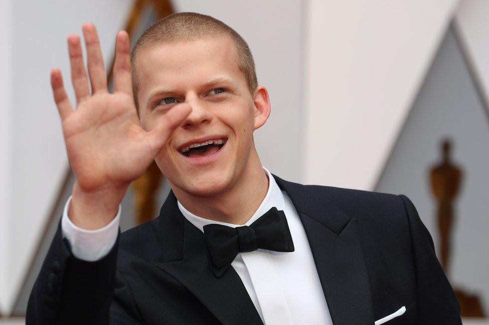 Actor Lucas Hedges poses on the red carpet