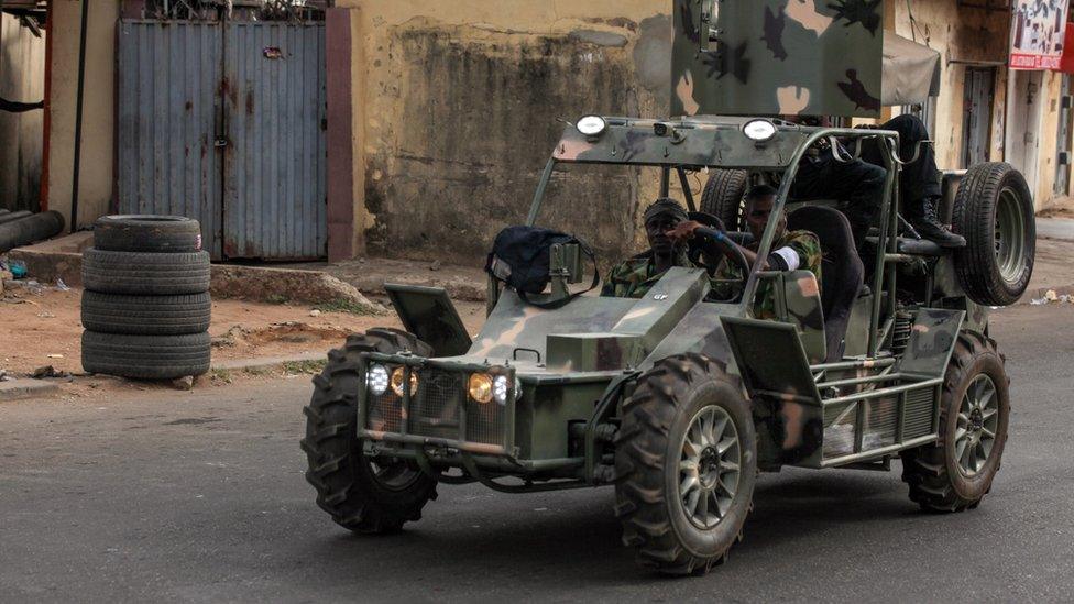 Nigerian army vehicle on road