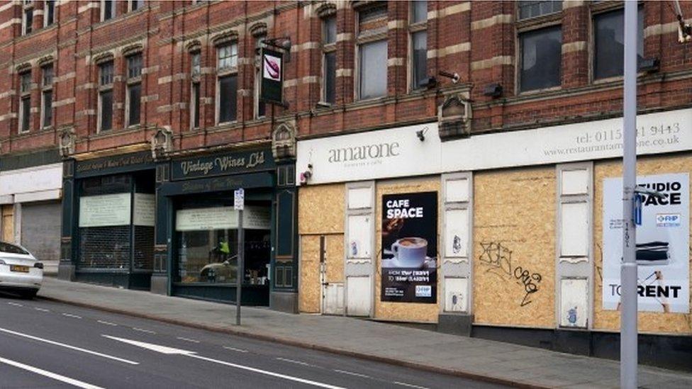 Boarded up shops on Nottingham