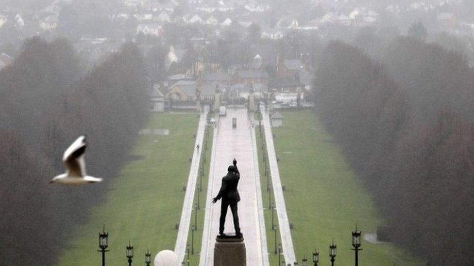 A statue of 1920"s Ulster Unionist politician Edward Carson overlooks the grounds of Stormont estate, near Belfast Tuesday, Dec. 23, 2014