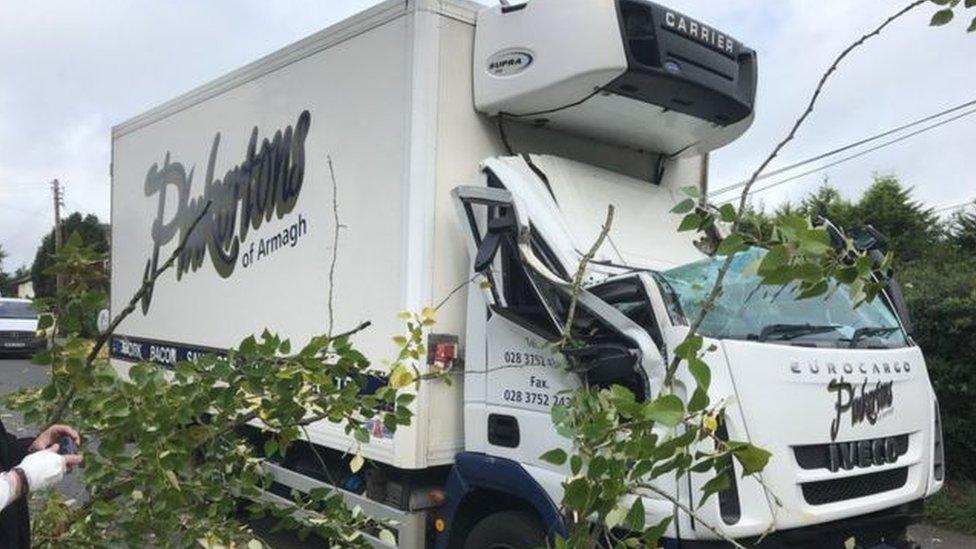 A lorry badly damaged by a falling tree in Dungannon, County Tyrone