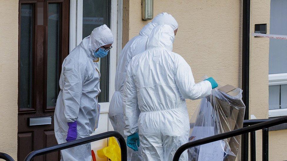 Forensic officers at murder scene in Lurgan