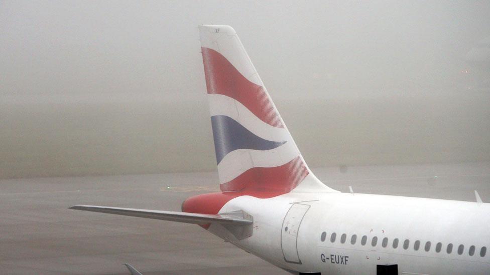 Plane in fog