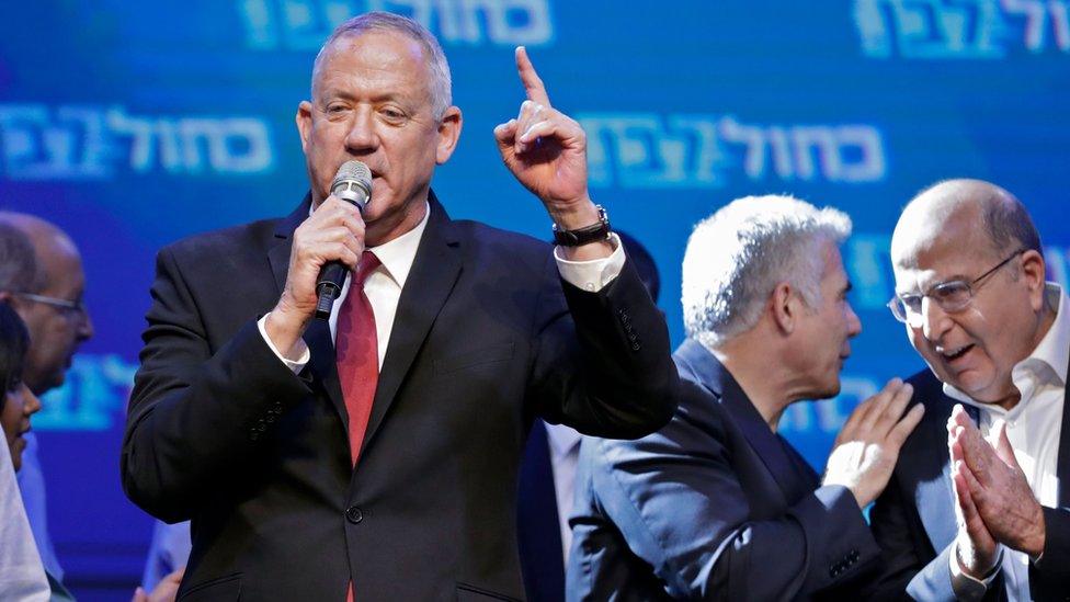 Benny Gantz speaks to supporters at a post-election rally in Tel Aviv on 17 September 2019