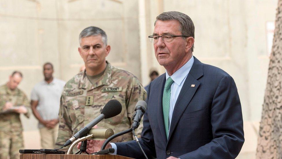 Office of the Secretary of Defense handout shows US Secretary of Defense Ash Carter (R) and US Army Lt. Gen. Stephen Townsend, commander of Combined Joint Task Force-Operation Inherent Resolve, host a press conference at the task force's headquarters in Baghdad, Iraq, 22 October 2016.