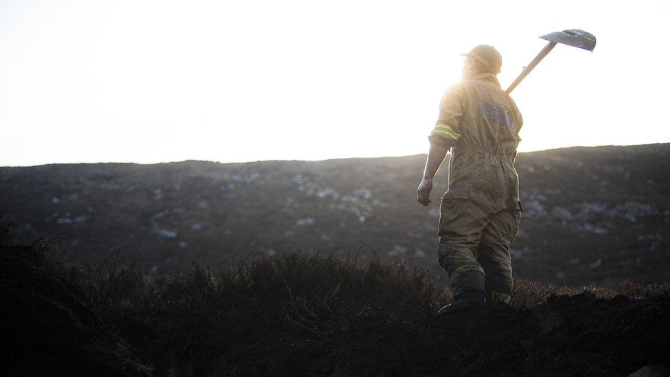 Firefighter with shovel