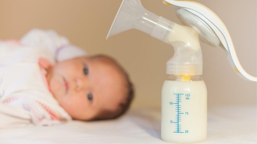 A container of baby milk