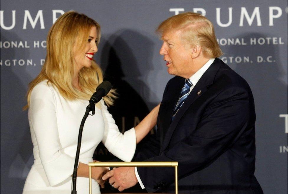 Donald Trump (right) shakes the hand of his daughter Ivanka at a ribbon-cutting ceremony at the new Trump International Hotel in Washington on October 26, 2016.