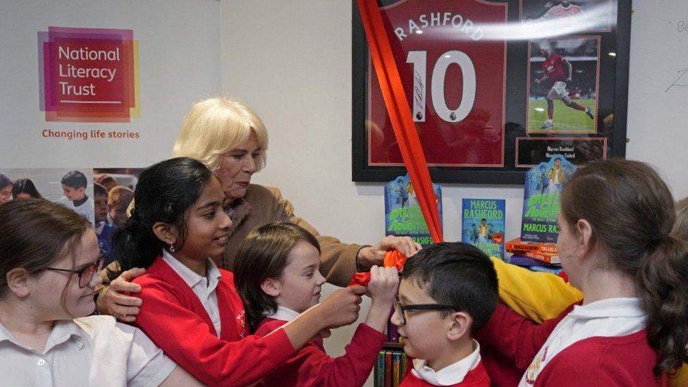 The Queen Consort interacts with childrenduring a visit to the Norbrook Community Centre in Wythenshawe