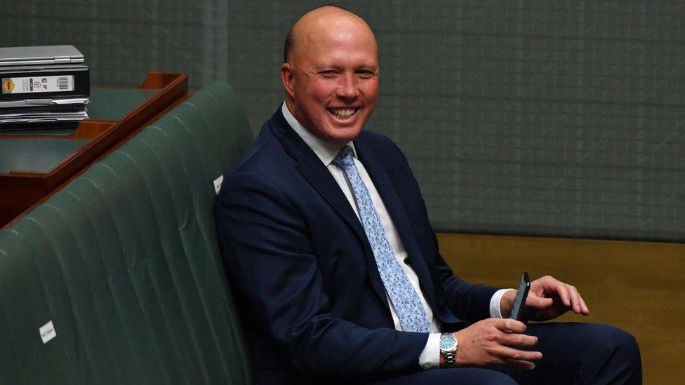 Peter Dutton smiles