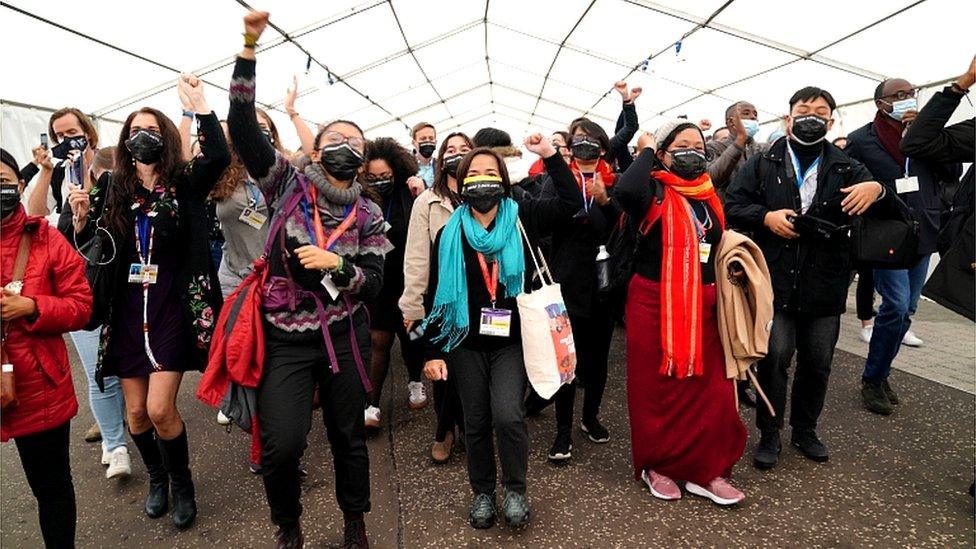 delegates walk out of the COP26 venue