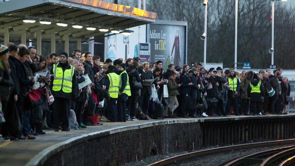 commuters waiting at Clapham junction on one of the southern strike days