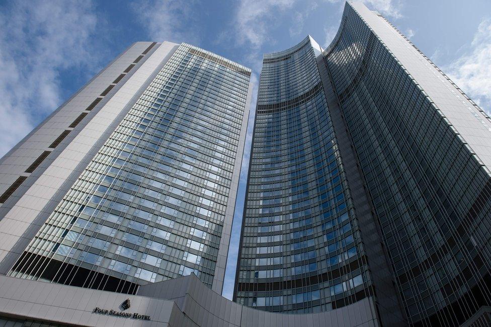 A general view shows the Four Seasons Hotel building in Hong Kong on 1 February 2017.