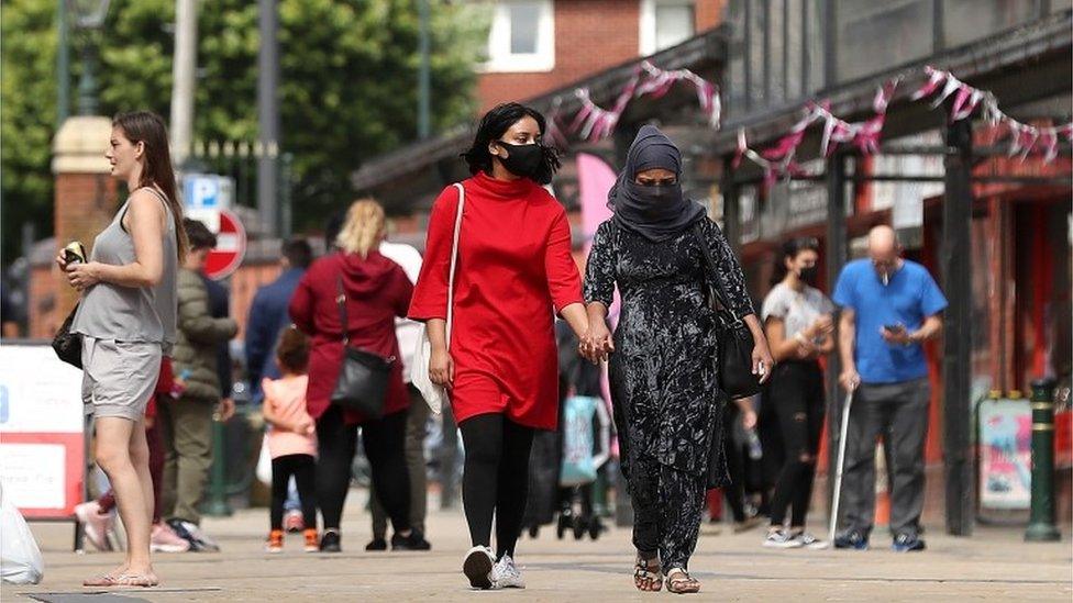 People shopping in Oldham