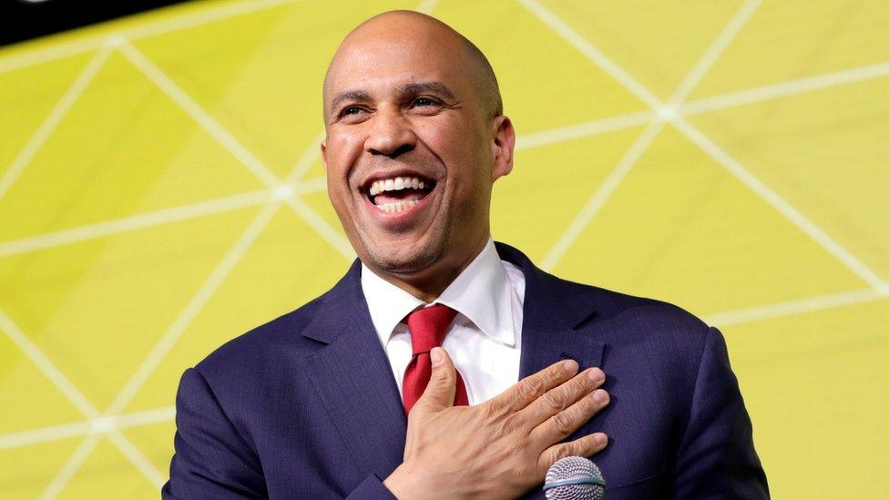 US Senator Cory Booker greets the audience at the US Conference of Mayors