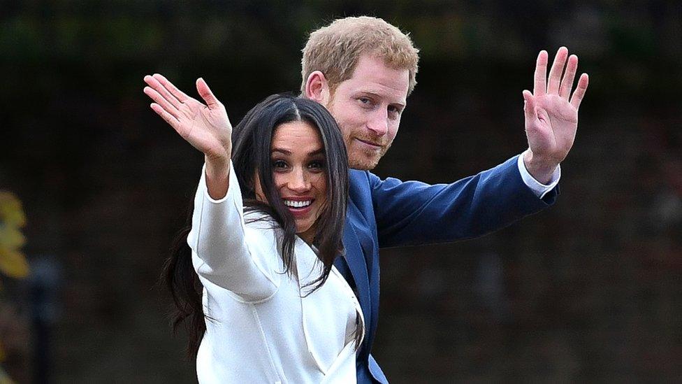 Meghan and Harry waving