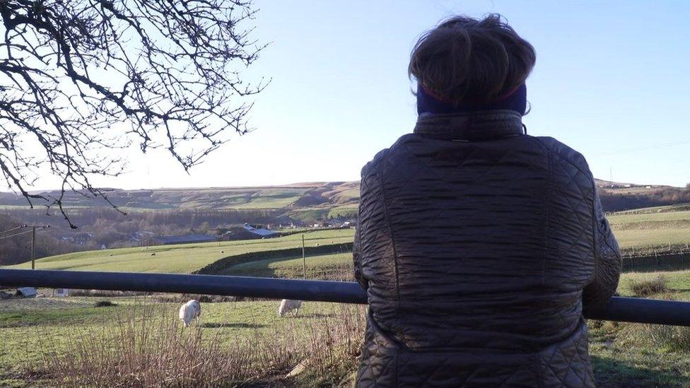 Hannah looking over the fields