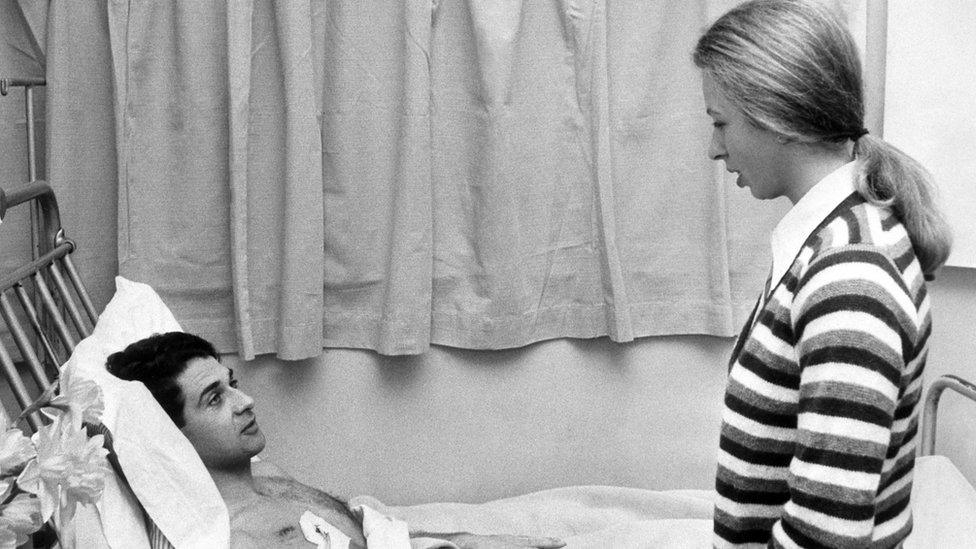 File photo dated 25/03/74 of the Princess Royal chatting to her bodyguard, Inspector James Beaton, after he was injured during Ian Ball"s attempt to kidnap her. Anne celebrates her 70th birthday on Saturday.