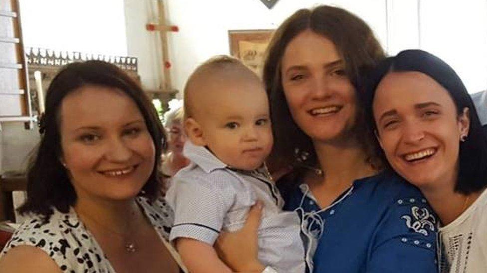 Tania Hebert, left, with her cousins at her son's christening