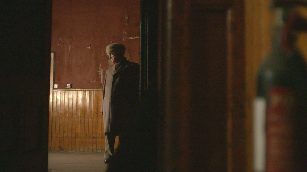 Peter in the derelict restaurant