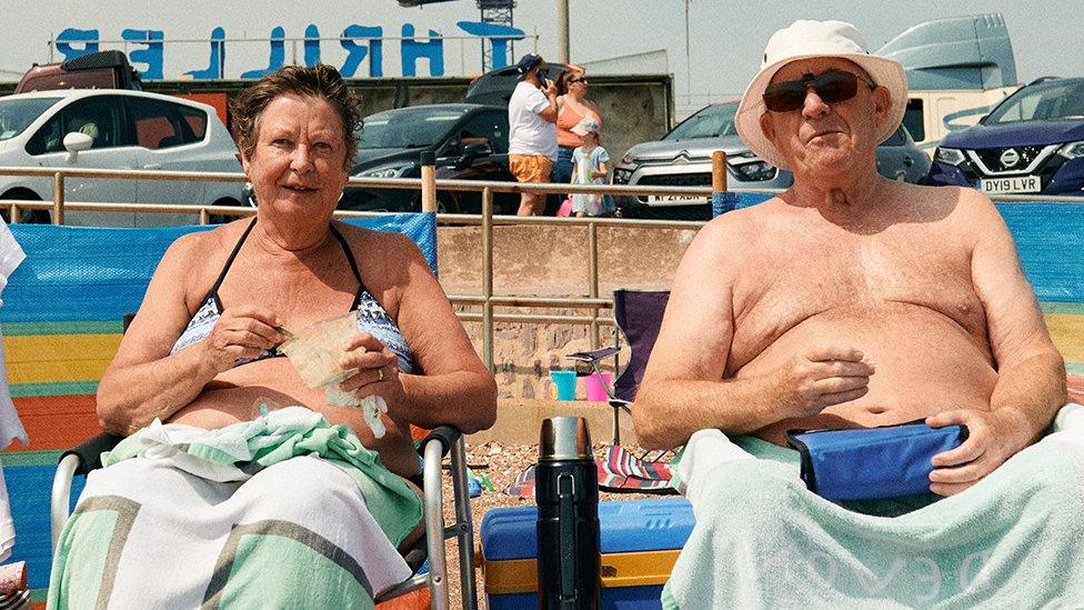 A couple eating lunch on Paignton Sands