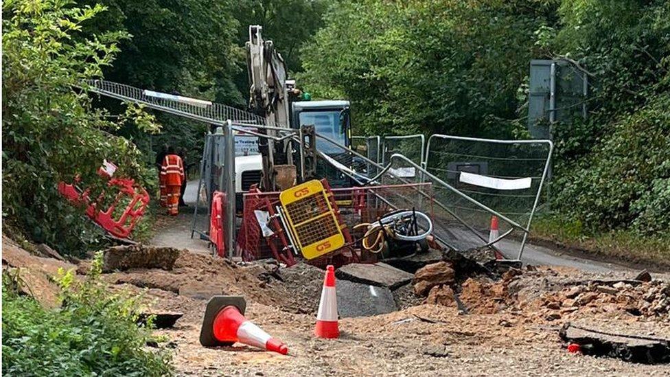 Damaged Reservoir Road