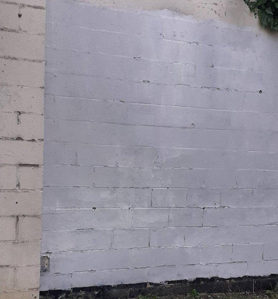 Painted over mural