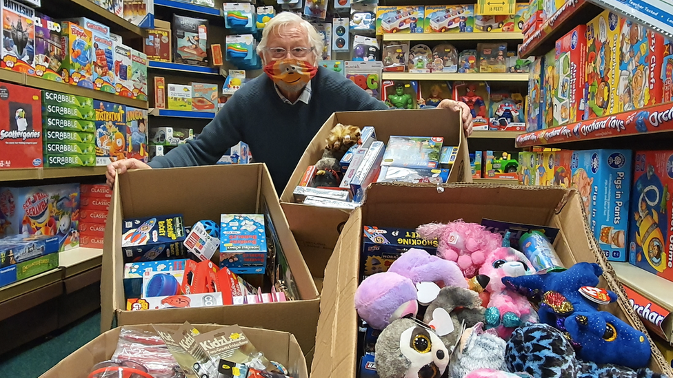 Paul Carpenter with some of the toys donated by customers for the appeal